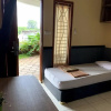 Отель Omah Pelem Syariah - Hostel, фото 21