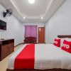 Отель OYO 1087 Udom Khomkham Apartment, фото 7
