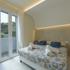 Отель I tre Golfi Isule Apartments Bilo primo piano, фото 35
