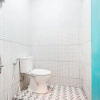 Отель OYO Living 1756 Amira Guest House, фото 15