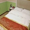 Отель Tengzhou Nanhai Longgong Business Inn, фото 1