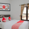 Отель OYO 1038 Embun Pagi Syariah Residence, фото 3