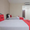 Отель Reddoorz Plus Near Syamsudin Noor Airport, фото 4