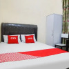 Отель OYO 90785 Mutiara Guest House, фото 6
