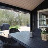 Отель 9 Person Holiday Home in Albaek, фото 6