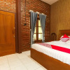 Отель OYO 1230 Kampoeng Osing Syariah Guesthouse, фото 21