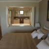 Отель Escape Bed & Breakfast в Керрамбин-Вэлли