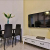 Отель Designed Beach Apartments, фото 3
