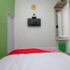 Отель D'residence Syariah by OYO Rooms, фото 10