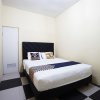 Отель Tiga Mas Inn by OYO Rooms, фото 4