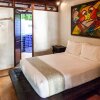 Отель Latitude 10 Exclusive Beach Resort в Мансанильо