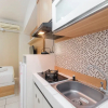 Отель Modern Studio with Great Lake View at Springlake Summarecon Apartment, фото 9