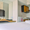 Отель Compact and Modern Studio Room at Casa De Parco Apartment, фото 4