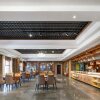 Отель Vienna International Hotel of  Yingbin Road Altay Airport, фото 2