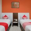 Отель OYO 589 Hotel Desa Puri Syariah, фото 13