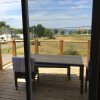 Отель Cottage Jasmine on the Shediac Bay With hot tub, фото 15