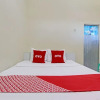 Отель OYO 92884 Agustha Homestay, фото 6