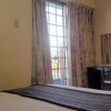 Отель Qing Taoyuan Homestay, фото 1