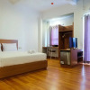 Отель Azalea Suites Cikarang Studio Apartment with Bathtub, фото 1