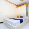 Отель SPOT ON 2473 Buana Jaya Guest House, фото 3