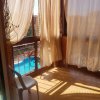 Отель Apartment with 2 Bedrooms in Mohammédia, with Wonderful Sea View, Pool Access, Furnished Garden - 20, фото 8