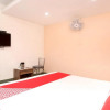 Отель OYO 15030 Hotel ESS PEE Grand, фото 14