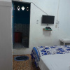 Отель OYO 91477 Fazira Home Stay Syariah, фото 8