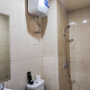 Отель Homey and Comfy 2BR at Vida View Apartment, фото 9