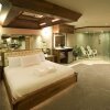 Отель Sybaris Pool Suites, фото 6