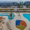 Отель Tilghman Beach and Golf Resort by Condo-World, фото 15