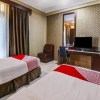 Отель OYO 90564 Hotel Merangin Syariah, фото 22