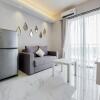 Отель Nice and Elegant 2BR at Sky House BSD Apartment, фото 4