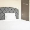 Отель Comfortable And Homey 2Br Belmont Residence Puri Apartment, фото 17