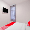 Отель OYO 90306 Mmtc2 Guest House, фото 6