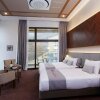 Отель Ramada Hotel & Suites by Wyndham Gangwon Pyeongchang, фото 42