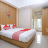 Отель OYO 999 Garuda Guesthouse, фото 4