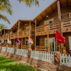 Отель OYO 14146 Home Modern Beach Cottages Morjim, фото 14