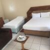 Отель Residence Inn Guest House в Мауне