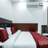 Отель OYO 14136 hotel toto international, фото 2