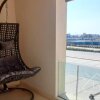 Отель Taj Home, Stunning Mangroovy 1 BR, sea view. Free pool and Beach access, фото 5