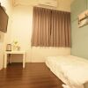 Отель Ximen Triple Tiger Hostel в Тайбэе