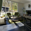 Отель Modern Chalet with a Barbecue at the Forest, фото 25