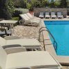Отель Luton Apartments, Zadar - Kozino, Heated Pool & Hot Tub, фото 14