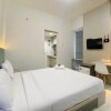 Отель Comfortable 1Br Without Living Room At Amartha View Apartment, фото 5