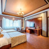 Отель Xishuangbanna Painama Yicheng Sunshine International Hotel, фото 1