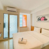 Отель Cozy Stay Studio At Tamansari Iswara Apartment, фото 7