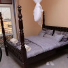 Отель City Oasis - 2 Bedroom Apartment in Kampala, фото 8