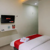 Отель RedDoorz Syariah At Kotabaru M Yamin Street Pontianak, фото 3