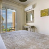 Отель Deluxe Kefalonia Apartment Apartment Leyland 1 Bedroom Pool and Sea View Karavomilos, фото 1