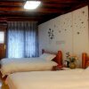 Отель Lijiang Porcelain Inn, фото 1